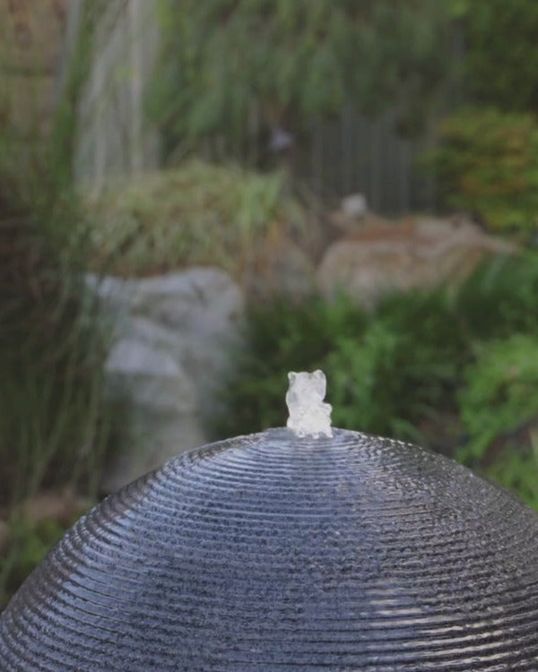 Enigma Sphere fountain in the garden