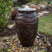 Scalloped Urn Water Feature Fountain in the garden