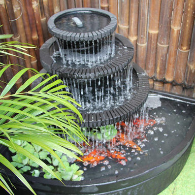 Three Tier Corner Bowl Balinese Style Water Feature Fountain with some goldfish