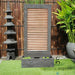 Zig Zag Copper Wall Water Feature in the garden