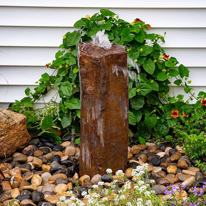 faux basalt water fountain with flower