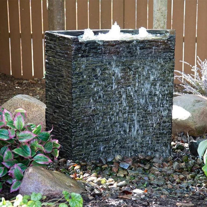 stacked slate water feature in the garden