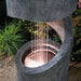 Abstract Spiral Rainfall Water Feature Fountain with Light Closeup