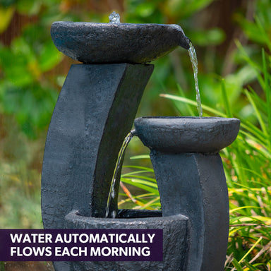 Solar Cascade 3 Tier Plates Water Feature  in the garden