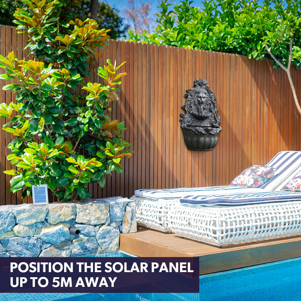 PROTEGE Lion Head Solar Powered Water Feature Fountain on poolside