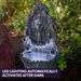 PROTEGE Lion Head Solar Powered Water Feature Fountain in nature